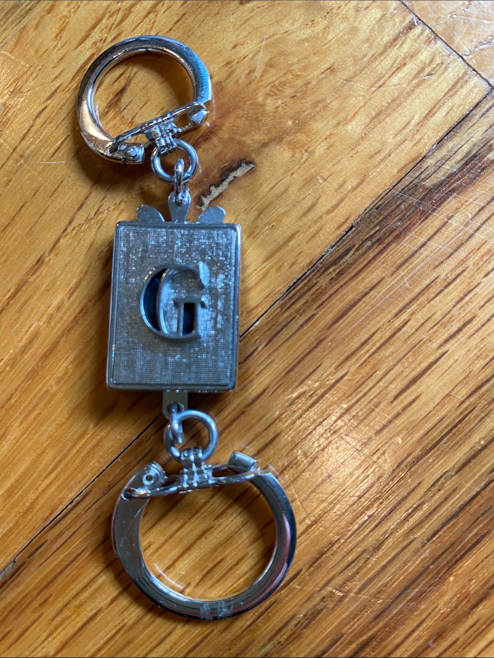 Silver Keychain Charm with Raised 'G' Accent